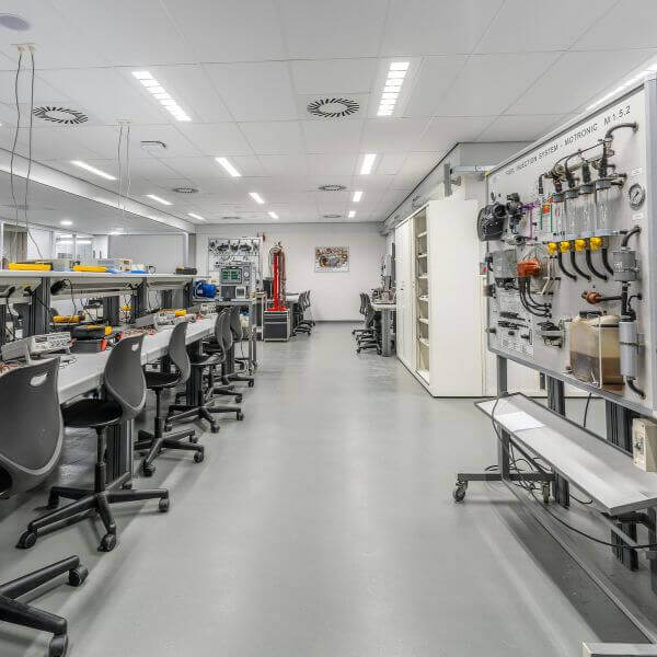 Engineering facility epoxy flooring installed by Epoxy Flooring Guys Perth, made to handle oils, machinery, and foot traffic.