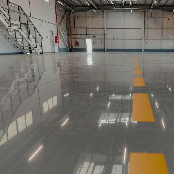 Industrial epoxy flooring by Epoxy Flooring Guys Perth, finished to handle tough use, chemical spills and heavy equipment with ease.