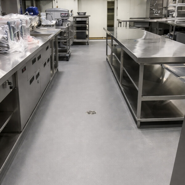 Commercial kitchen epoxy flooring in Perth featuring a smooth, easy-clean epoxy floor suited to commercial kitchens by Epoxy Flooring Guys Perth.